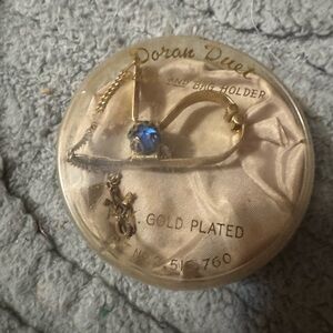 Vintage glove holder …gold tone with blue stones. 1940’s 1950’s